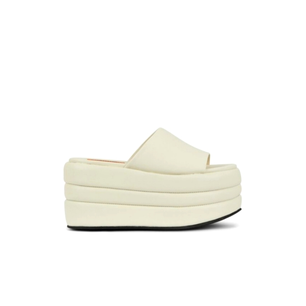 PUFFED BLACKOUT PLATFORM Simon Miller